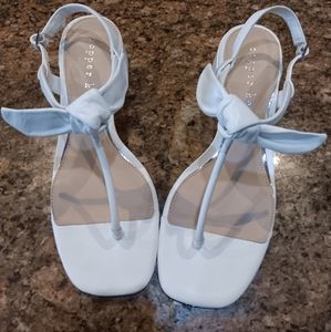 Copper Key White 2 in. block heel, with buckle strap.